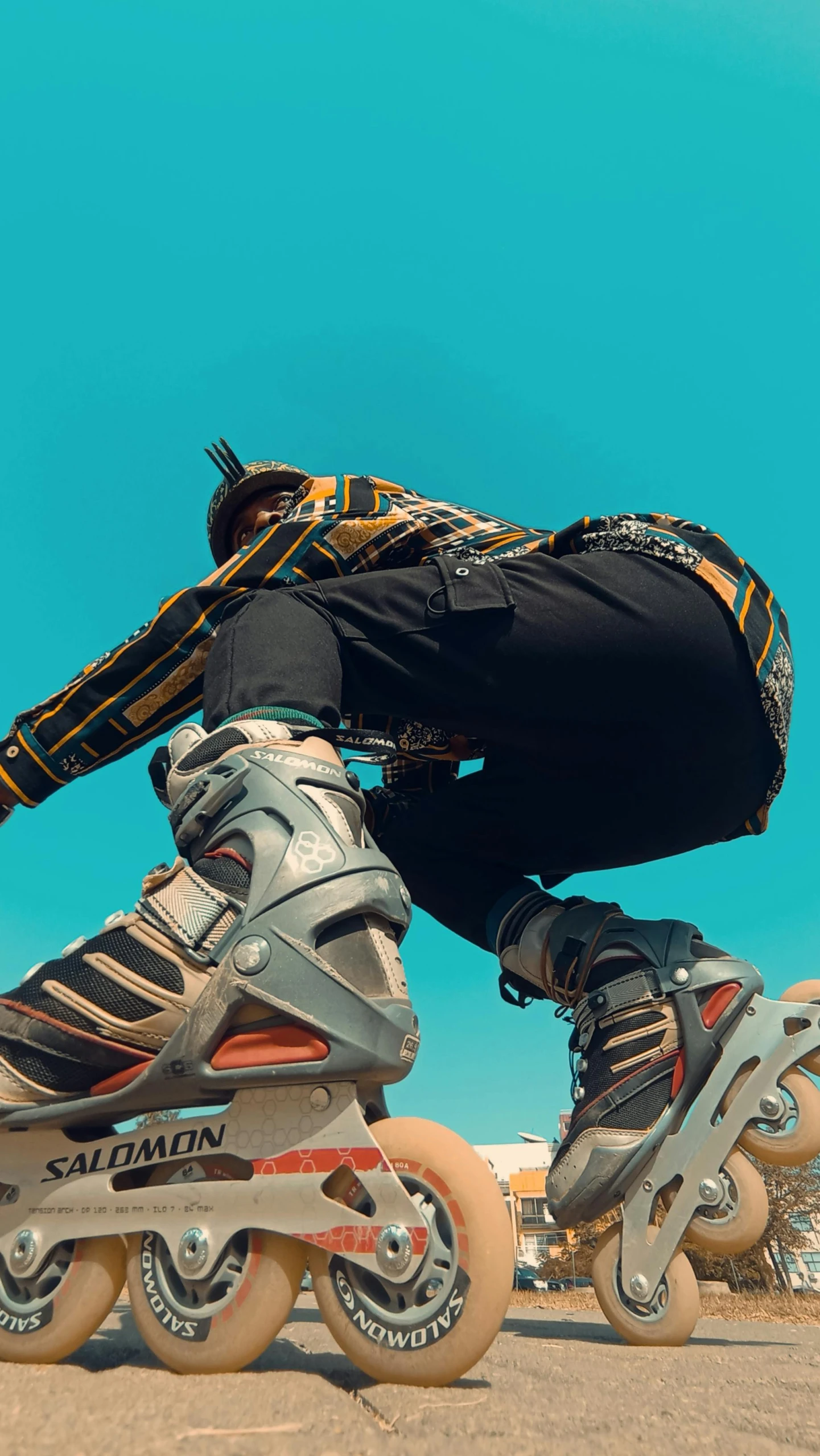 a close up view of a person riding on roller blades