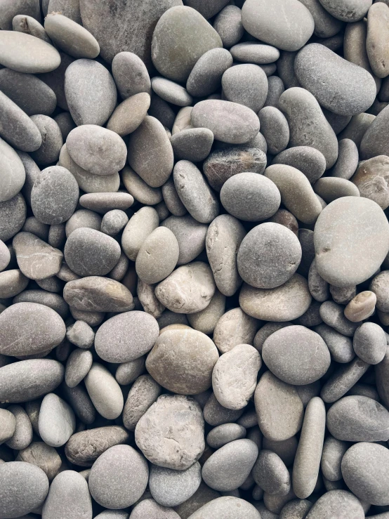 a mixture of stones and pebbles to be used as landscaping materials