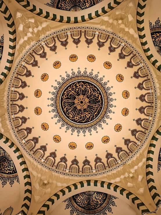 a circular painting on the ceiling in a building