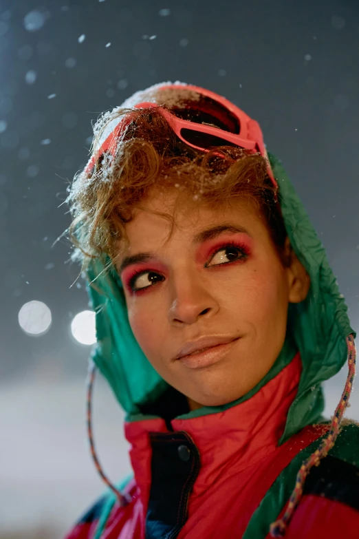 a woman wearing snow gear in the rain