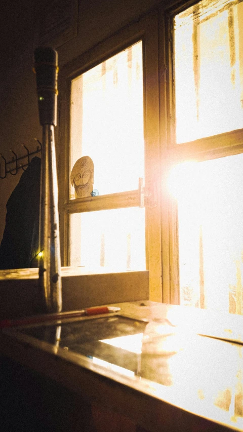 a tall white object is on the counter in a dark room