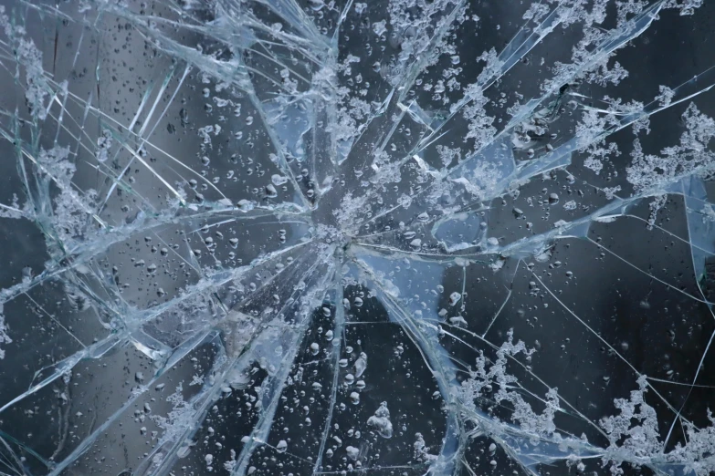 an image of an icy window with drops