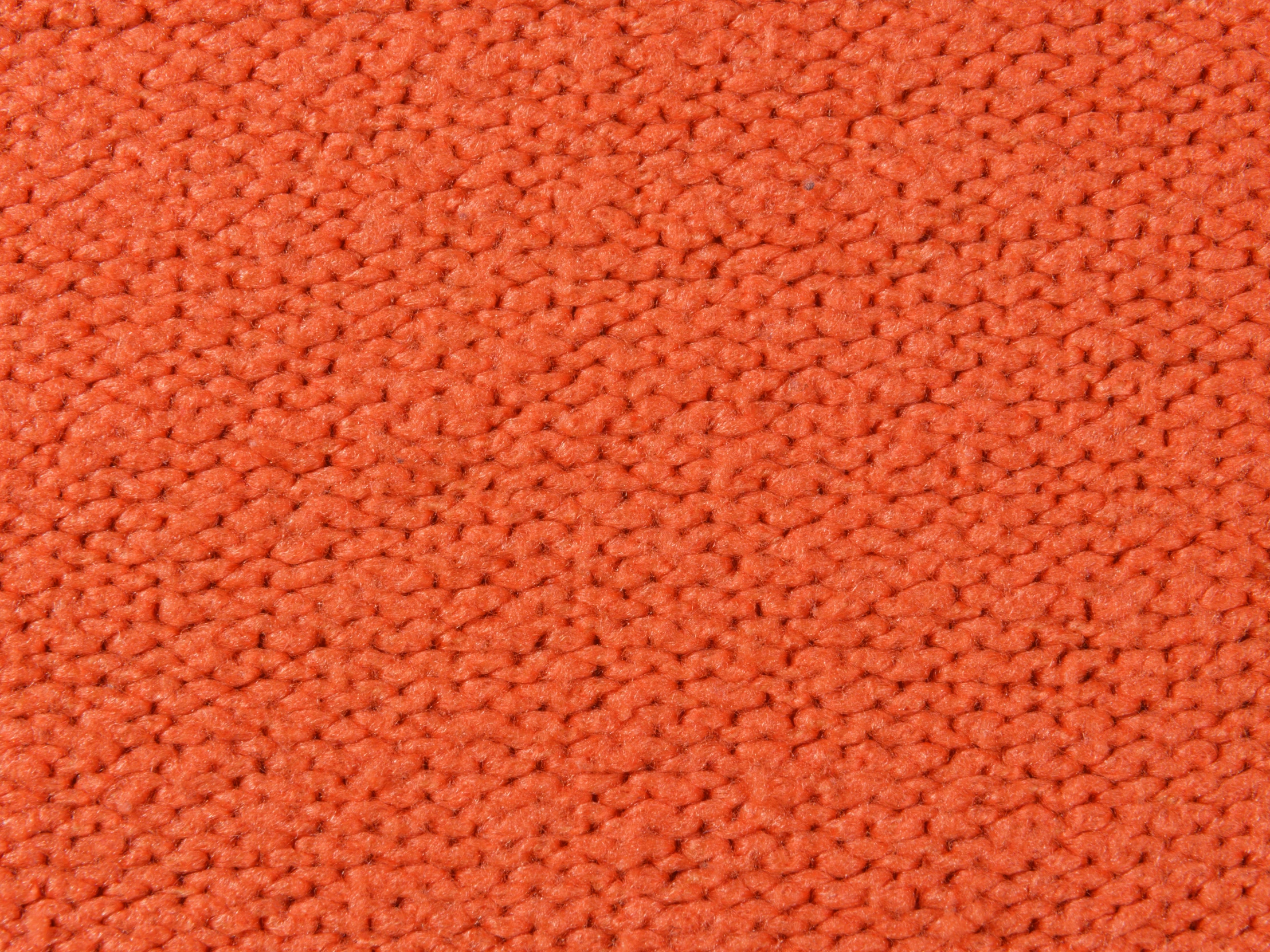 an orange material texture that appears to be woven