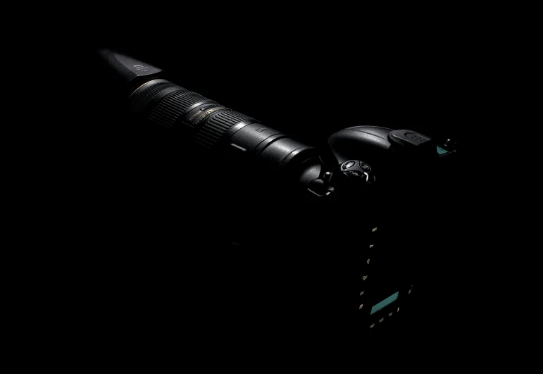 a flashlight on top of a black background