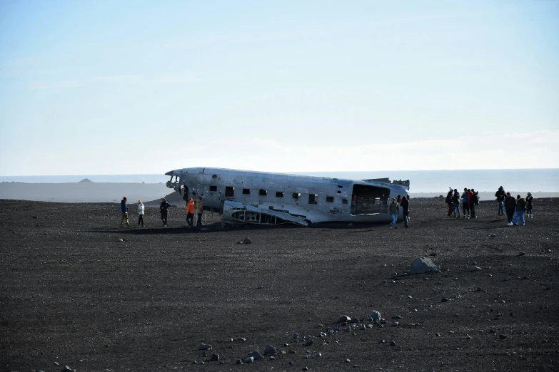 a plane that is on the ground in a field