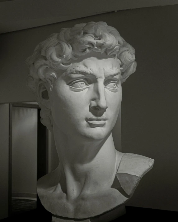 black and white pograph of a bust of a man