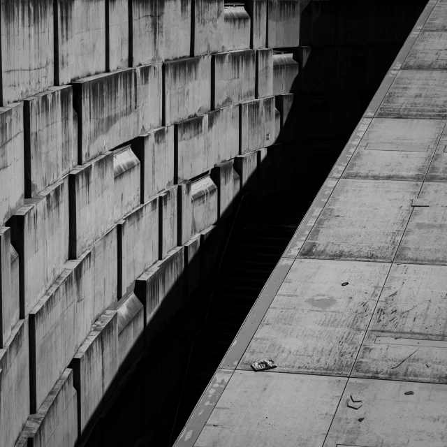 an empty wall on a brick wall with many boxes