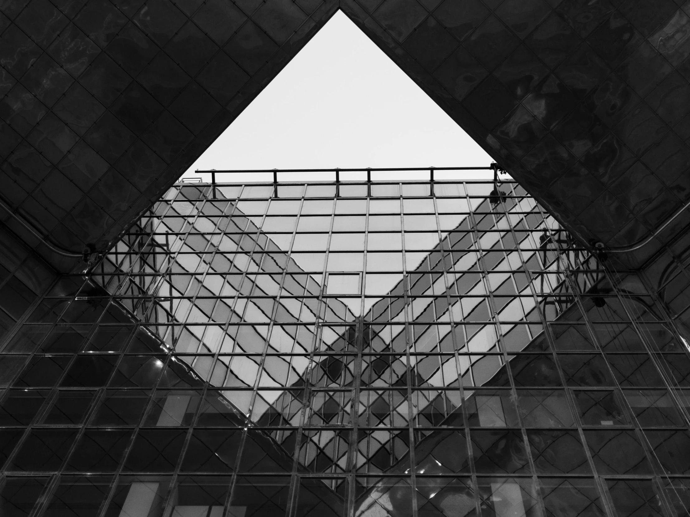 the view from inside of a building through some glass