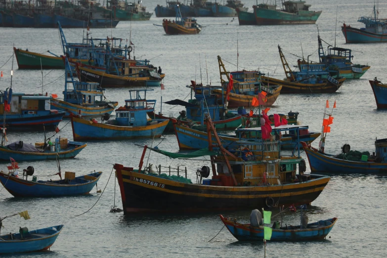 boats in the ocean surrounded by other water