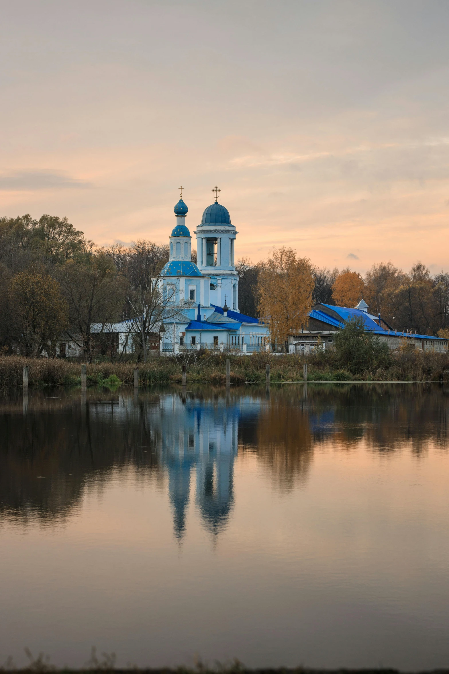 a church and its reflection in the water