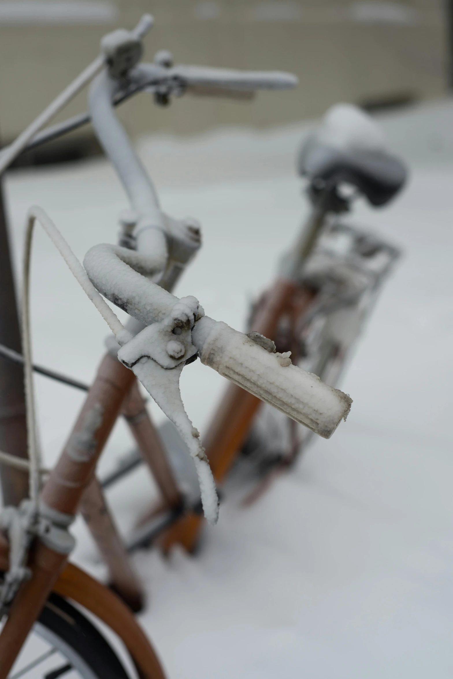 this is a bicycle covered in ice and snow