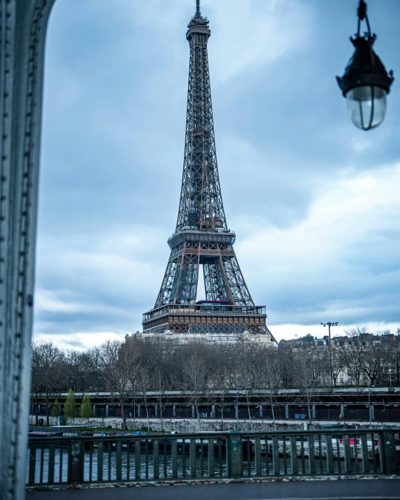 the eiffel tower is surrounded by trees