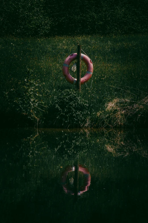 a round object floating on top of a lake