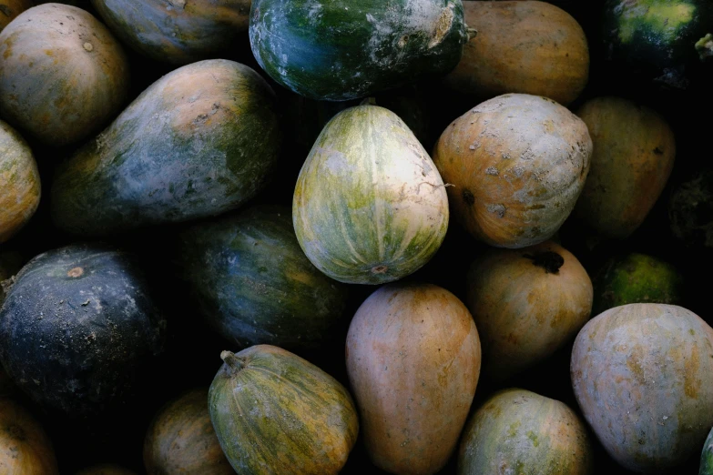 a pile of fruits that are next to each other