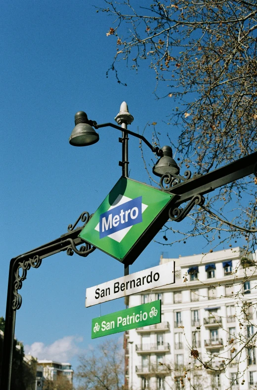 the street sign has two small signs below it