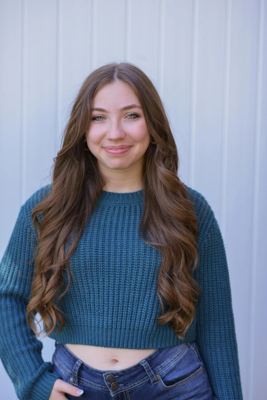 smiling young woman wearing an open front top