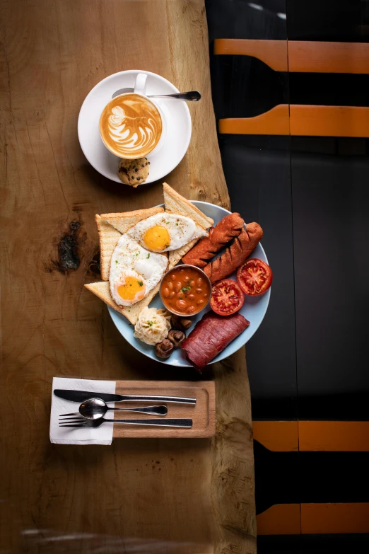 a full breakfast is arranged on a table