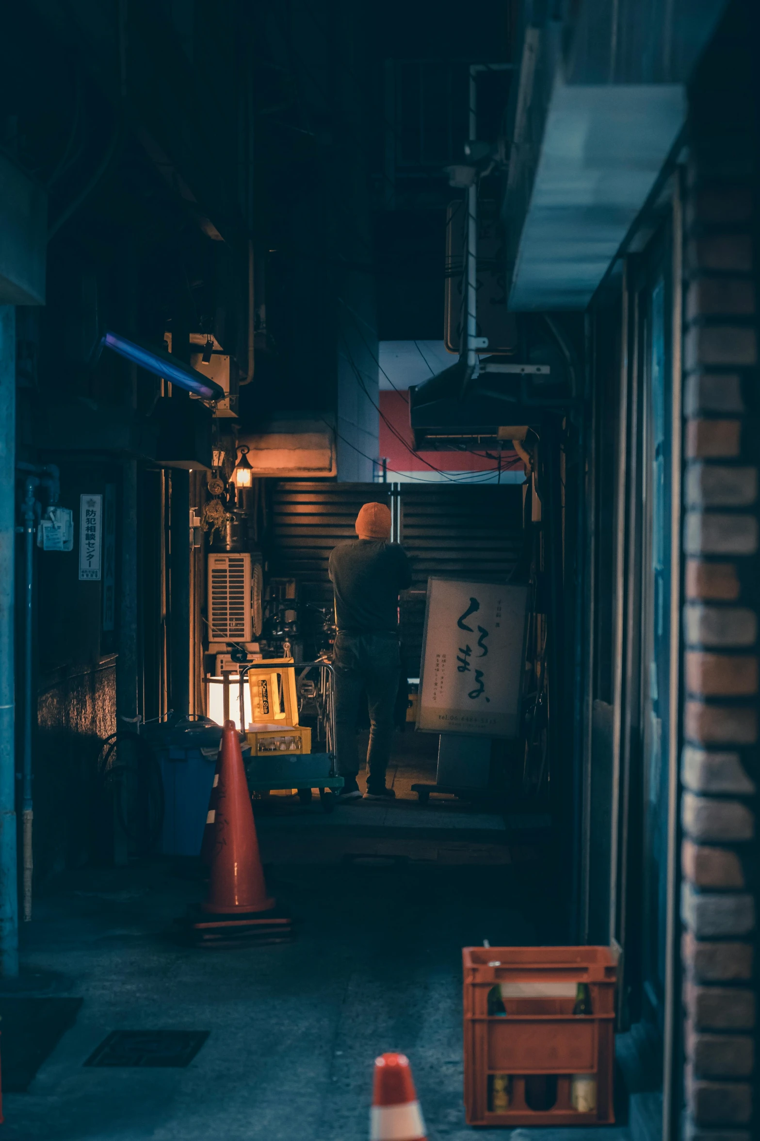 a small room filled with construction equipment at night