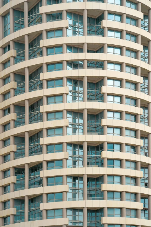 a tall building with lots of windows next to each other