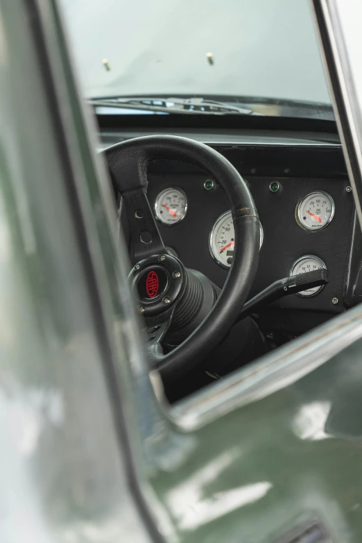 a car with gauges on the front and steering wheel