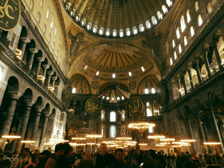 large church with lights and stained glass windows