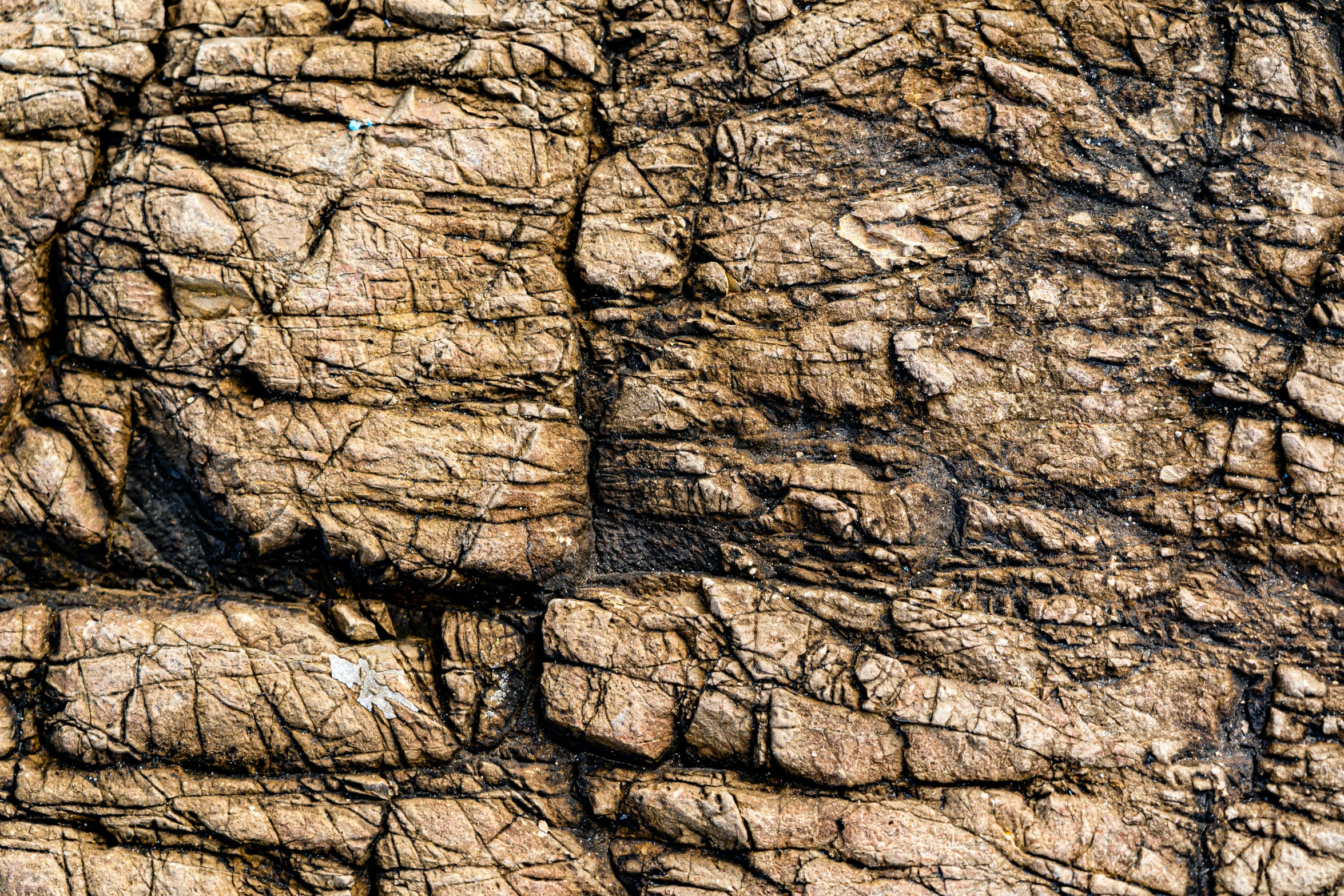 an image of the dirt and stone surface of an area