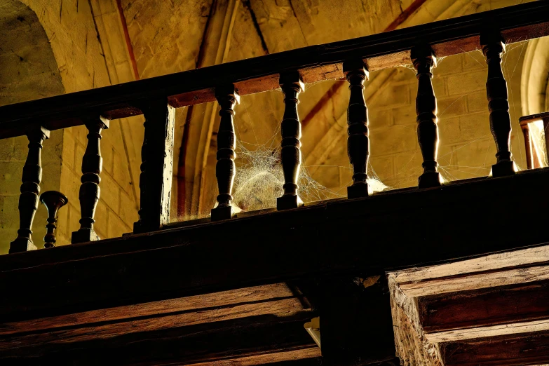 a stairway railing with glass doors on top of it