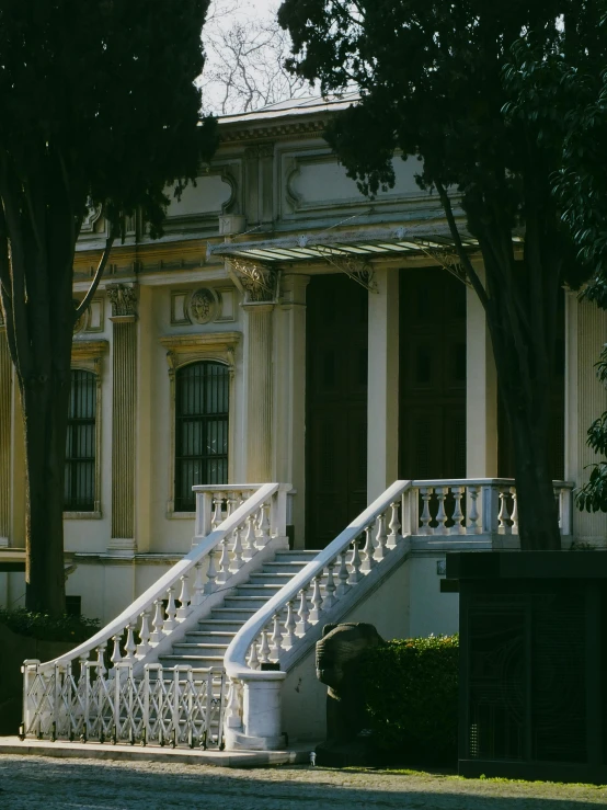 an old building with some stairs in front of it