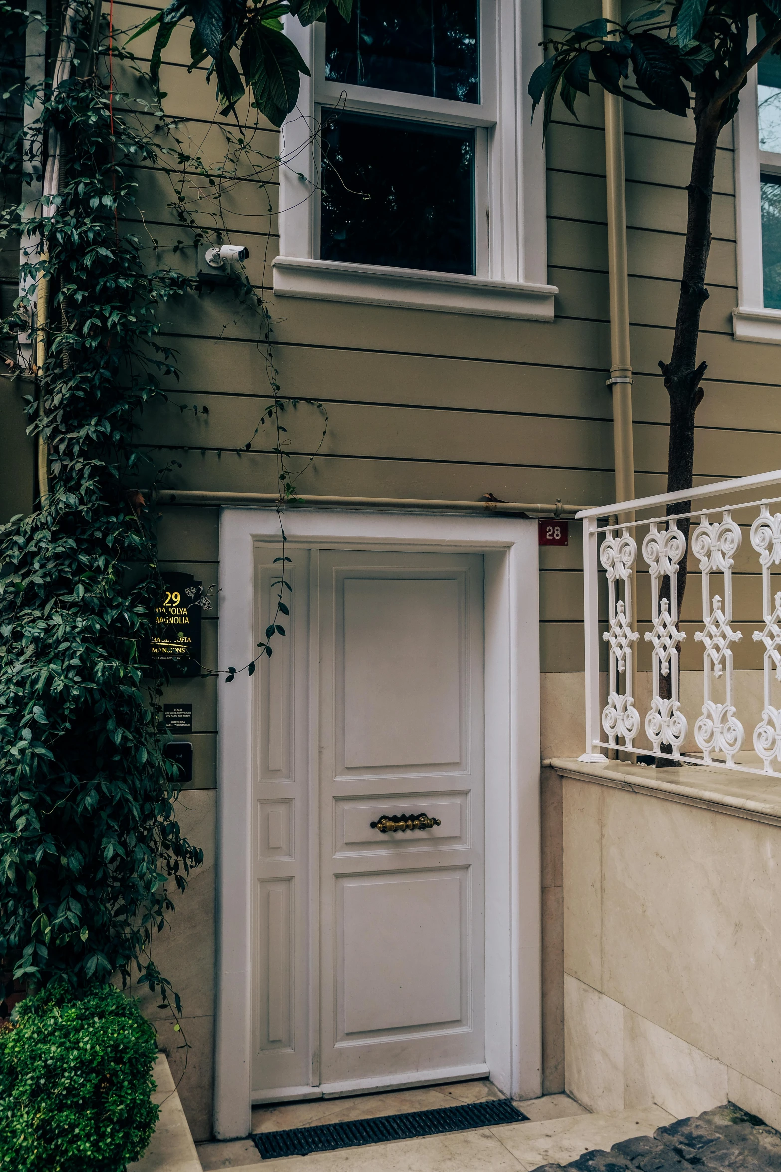 a white door on the outside of a house