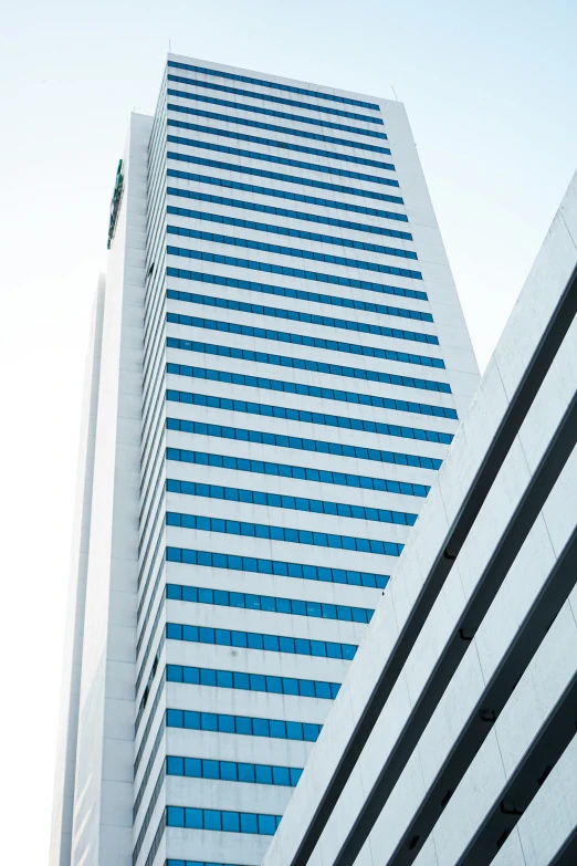 a very tall building with many windows on top