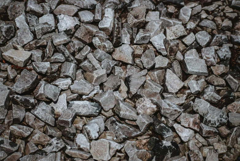 small rocks are arranged on the ground as seen from a distance