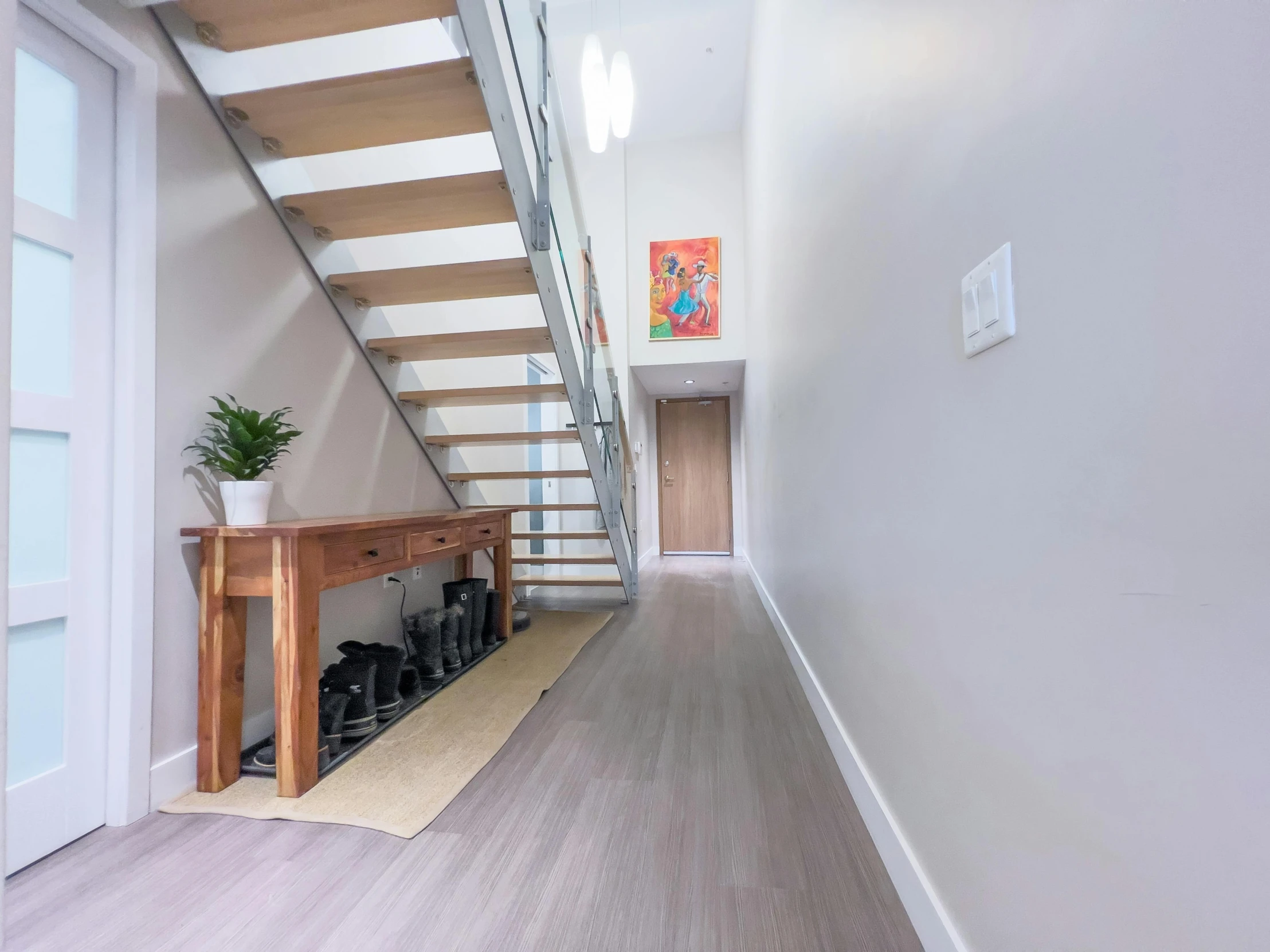 a view down the stairs inside an upstairs house