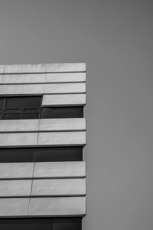 the view from the top of a building looking upward