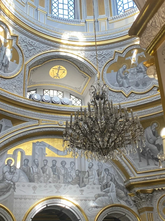 a beautiful room with ornate decor, chandelier and ceiling