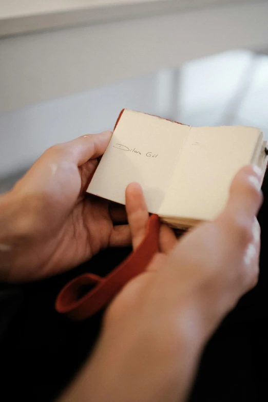 a woman is holding soing in her hands