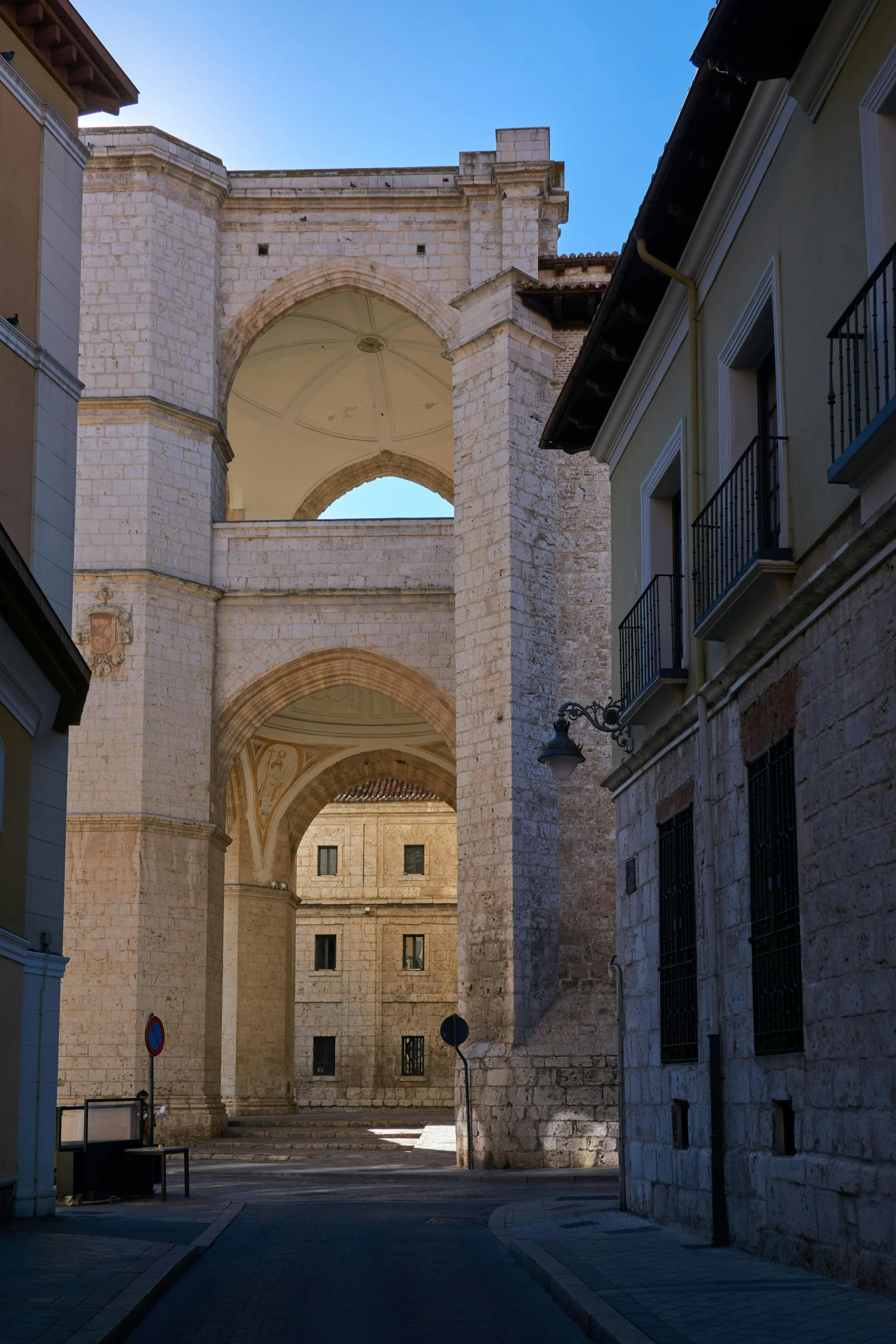 a tunnel in the middle of some buildings