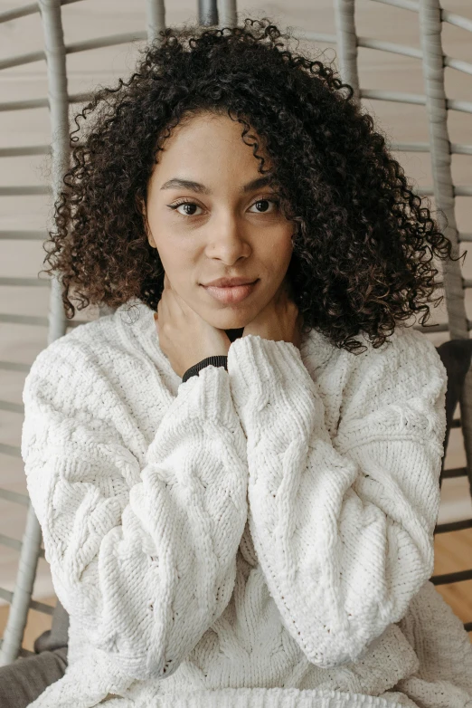 an image of a young woman posing for the camera