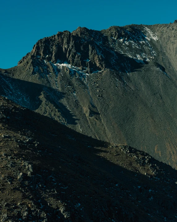 a black and white po of some mountains and clouds