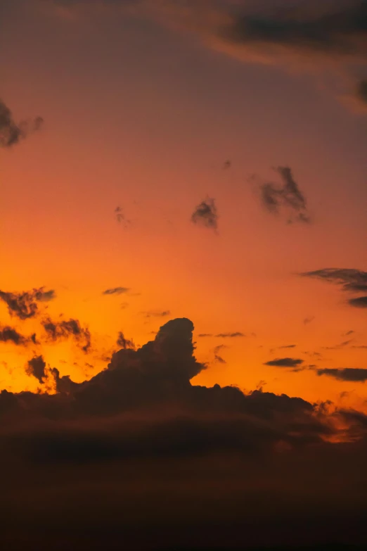 some sort of cloud type structure against a sunset sky