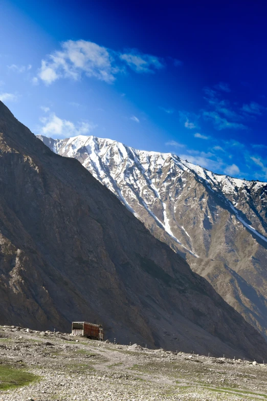 a beautiful view of mountains from a rocky cliff