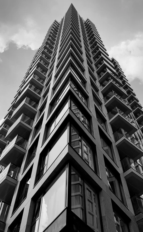 tall building with balconies and balconies on the sides