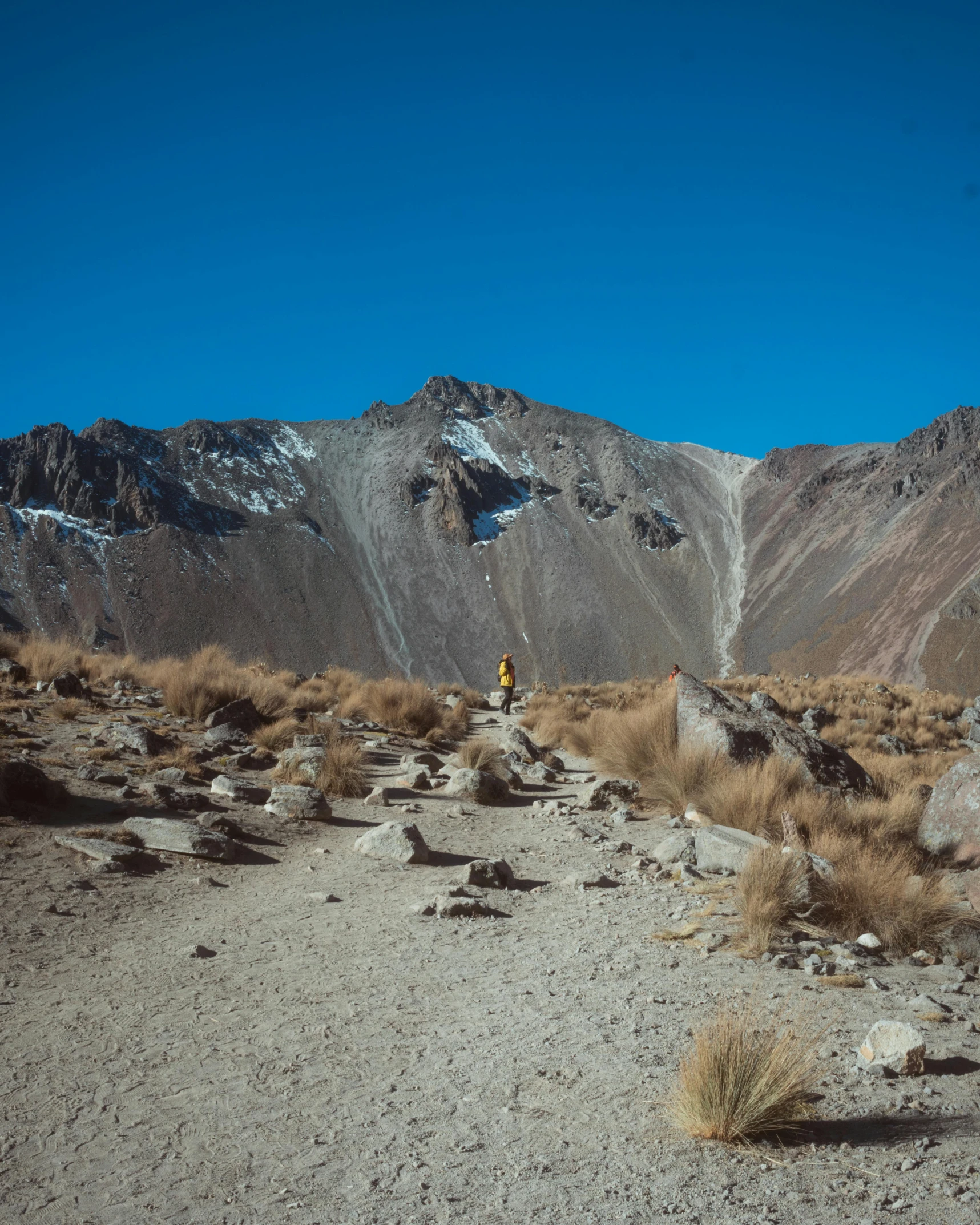 the mountains are rocky and have no snow