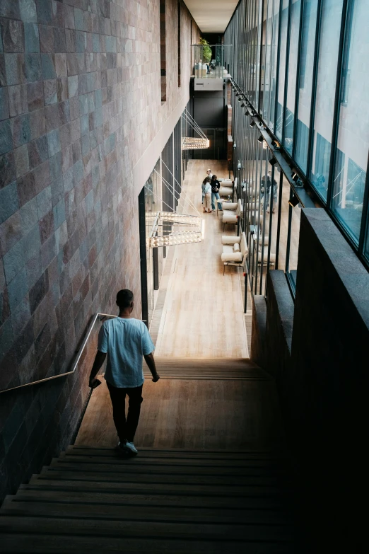 a person that is walking down some stairs