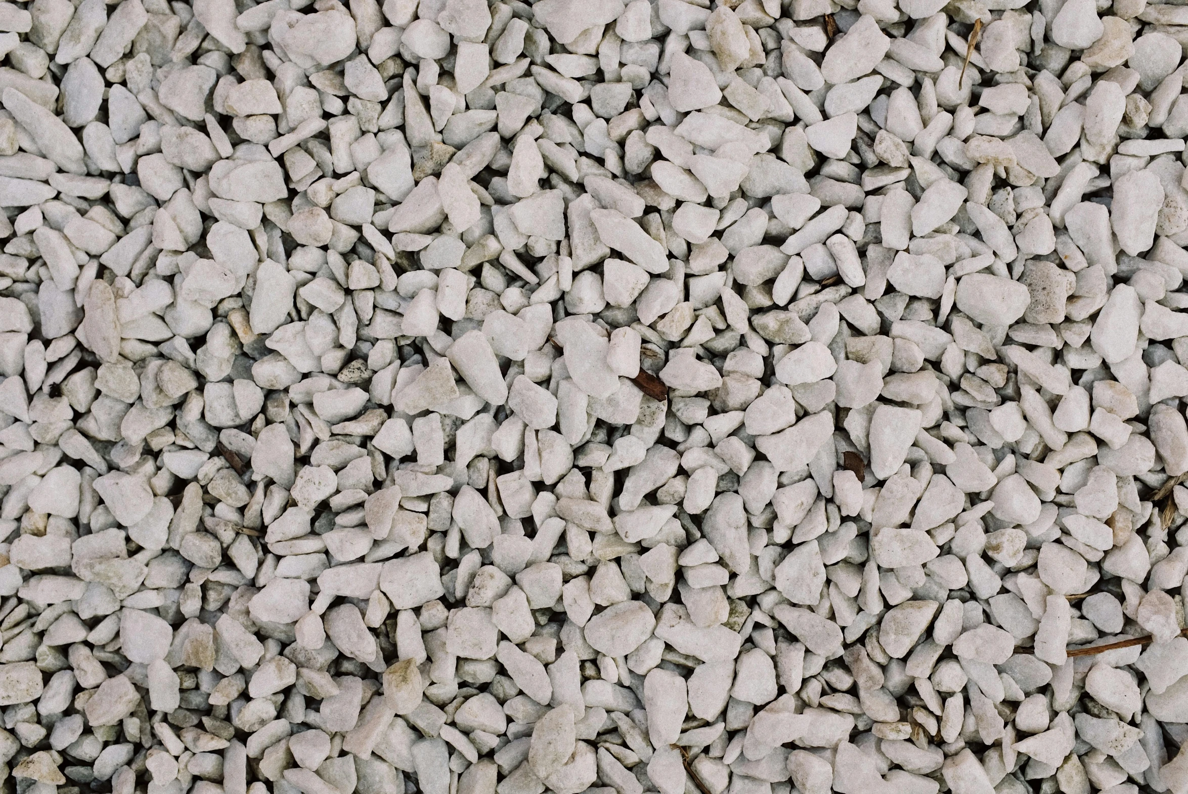 rock texture, made with gray stones, all over the surface