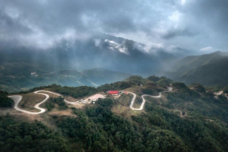 a scenic po of a road winding through mountains