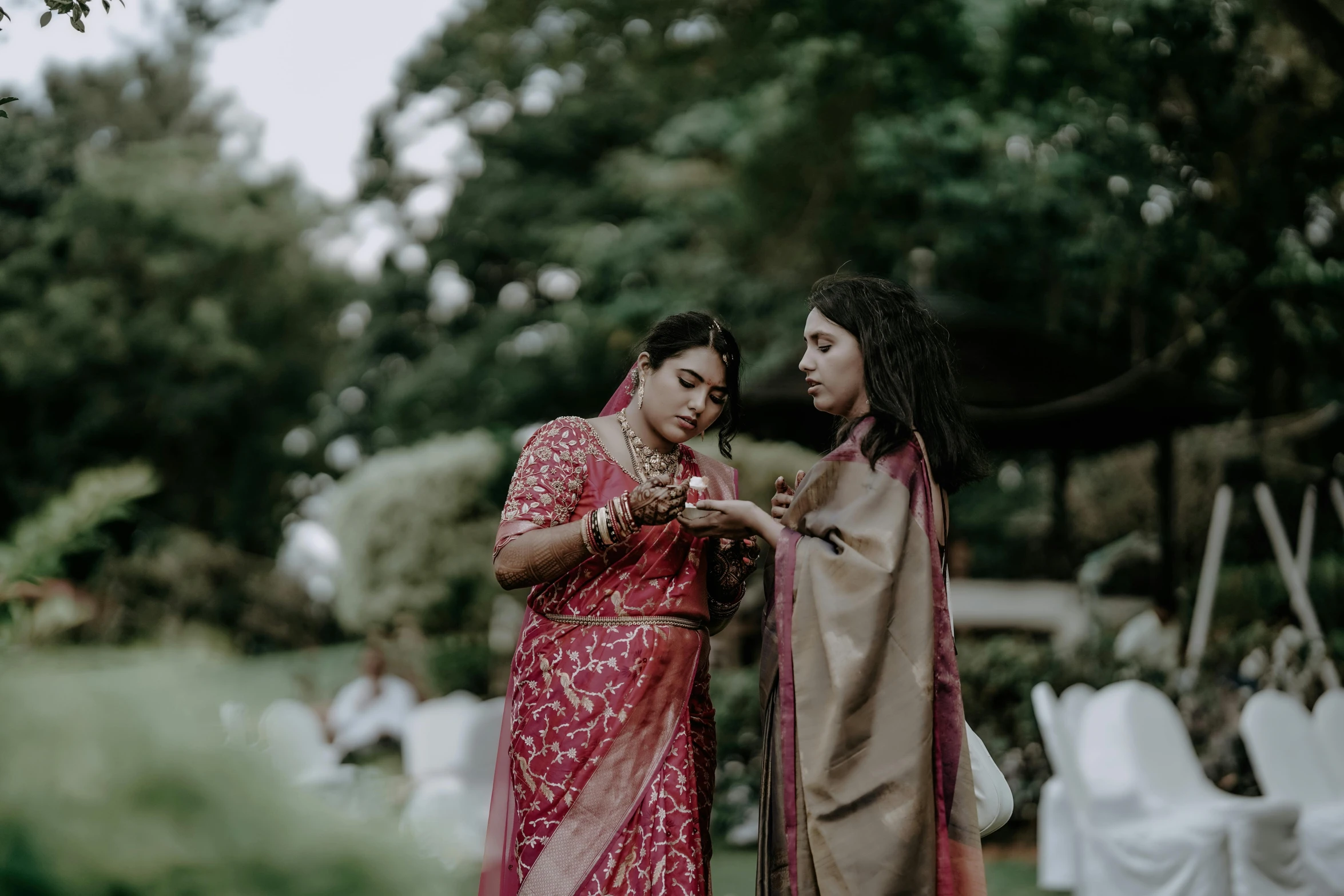 two women are in sari on their wedding day