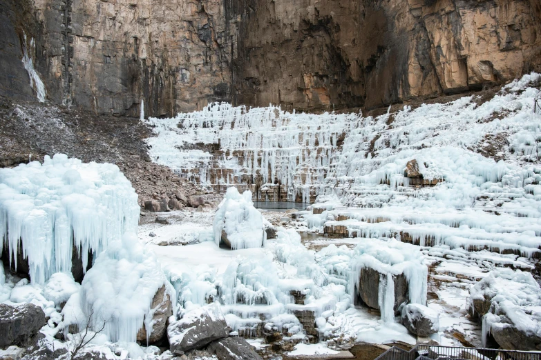 icicles have formed on the rocks and cliffs