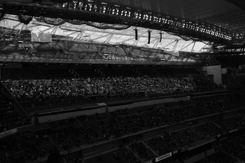 large crowd in an empty stadium at night