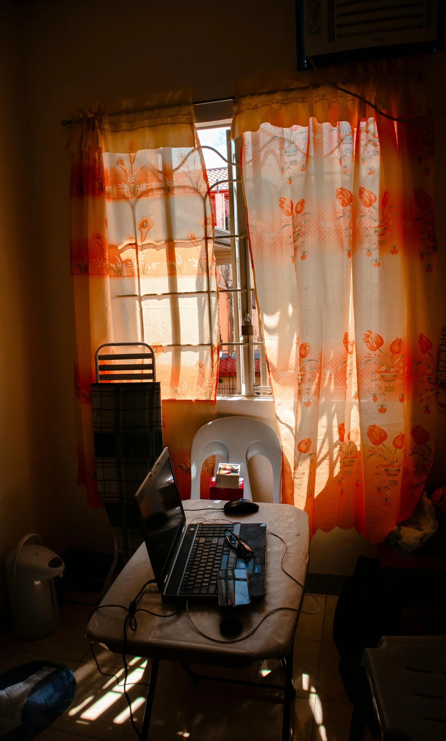 an open laptop computer sitting on a table