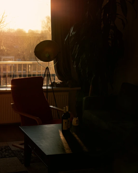 the sun is shining on a house near a window